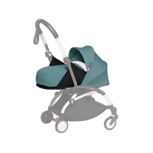 Teal baby stroller seat with black base on a white background